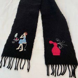 Cute and fun girl’s scarf with decorative details.